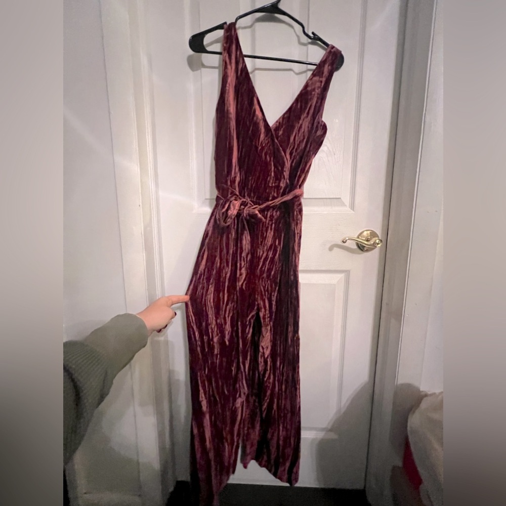 Wine color woman’s jumpsuit new with tags never worn!